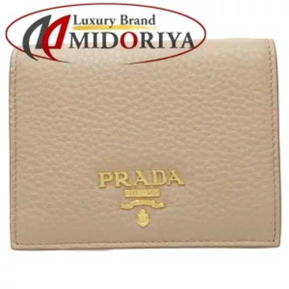 Prada Handbags - Prada compact bi fold wallet CAMMEO beige